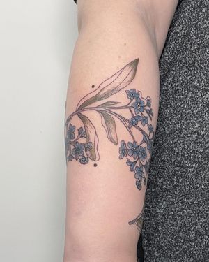 Elegant floral design by Kiky Flore, perfect for a subtle yet beautiful tattoo.