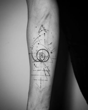 geometric shape with fine lines on forearm tattoo
