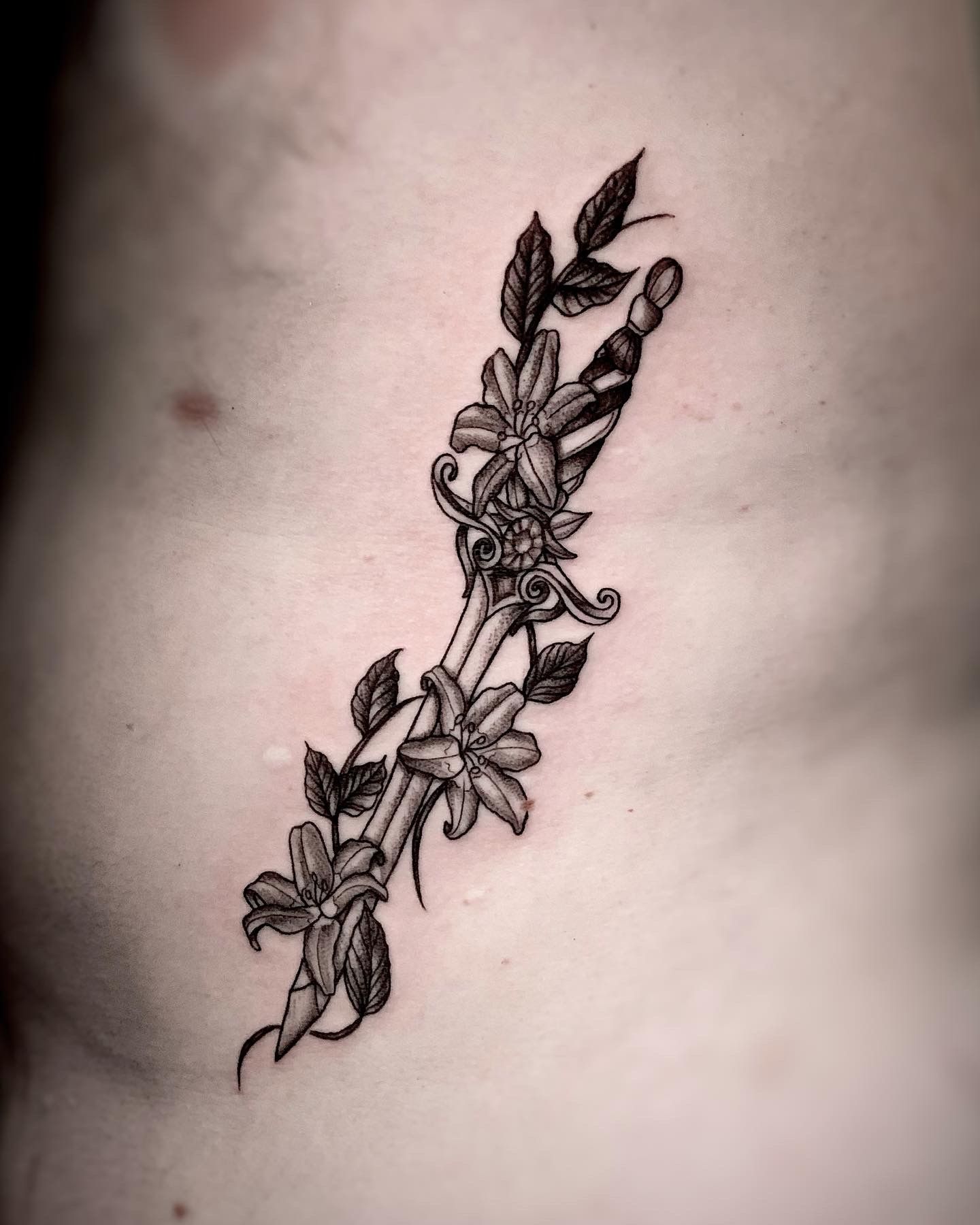 Inkscool Tattoos - Gladiolus flower also know as the sword lily made on a  client. For making the tattoo, Syed Hamza Ali took reference from the  actual gladiolus flower, studied the texture