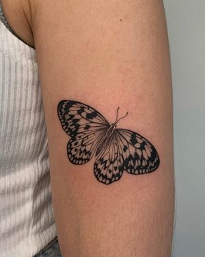 Stunning fine-line butterfly design by Ophelya Jeandat, combining dotwork details for a unique and beautiful look.