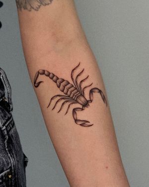 Unique black and gray scorpion tattoo by Ophelya Jeandat, perfect for a bold statement on your forearm.
