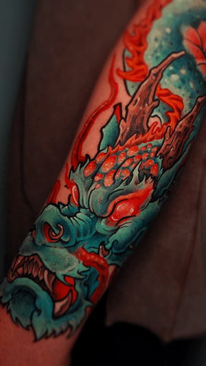 Experience the powerful fusion of traditional Japanese art with modern neo-traditional style in this stunning dragon design by Adrian Suez.