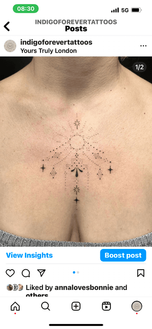 Embrace the cosmic energy with this ornamental sun and star chest tattoo by Indigo Forever Tattoos. Hand-poked with intricate dotwork design.