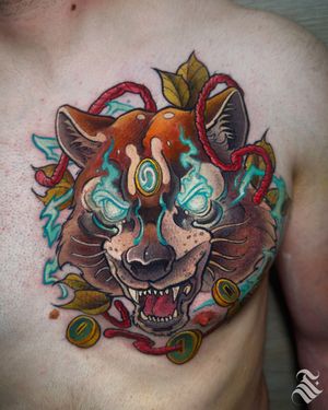 Adrian Suez combines neo-traditional and new school styles to create a vibrant tattoo featuring a bear and red panda with a coin motif.