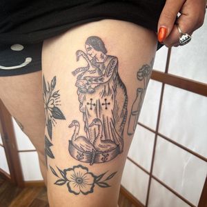 Get a unique illustrative tattoo featuring a woman and duck in dotwork style by Jack Henry Tattoo.