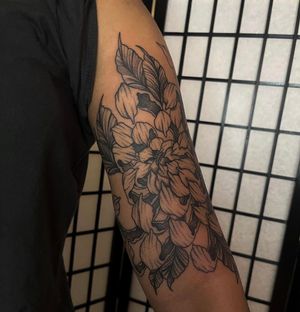 Beautiful peony flower tattoo with intricate whipshading, by artist Barney Coles. Illustrative style on the arm.