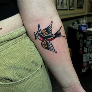 Get a timeless traditional sparrow design by talented artist Barney Coles. Perfect for lovers of classic tattoo art!