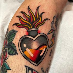 Get a classic heart tattoo with a twist of traditional style by the talented artist Barney Coles. Perfect for a timeless and meaningful design.