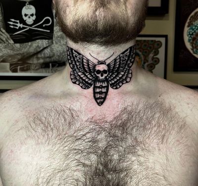 Get a stunning traditional death moth tattoo on your neck by talented artist Barney Coles.