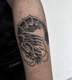 Get a bold and colorful prawn tattoo on your forearm, crafted in traditional style by the talented artist Barney Coles.