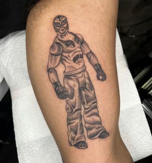 Unique dotwork illustration of a wrestling action figure by Barney Coles. Celebrate the luchador spirit on your arm!