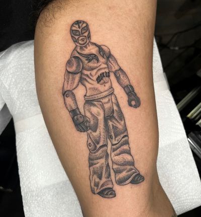 Unique dotwork illustration of a wrestling action figure by Barney Coles. Celebrate the luchador spirit on your arm!