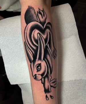Adorn your forearm with a classic bunny rabbit design by artist Barney Coles. Embrace the traditional style and showcase your love for cute animals with this charming tattoo.
