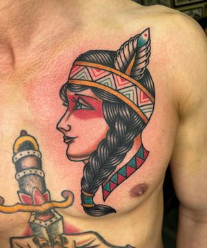 Experience the rich culture of India with this stunning traditional tattoo design by the talented artist Barney Coles. Perfect for those looking for a timeless and culturally significant tattoo.
