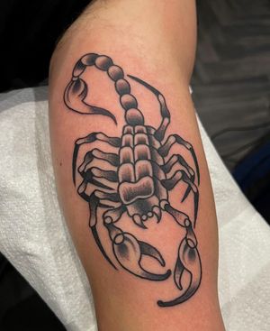 Get inked with a fierce scorpion design by tattoo artist Barney Coles. Perfect for the arm, this traditional style tattoo is sure to make a statement.