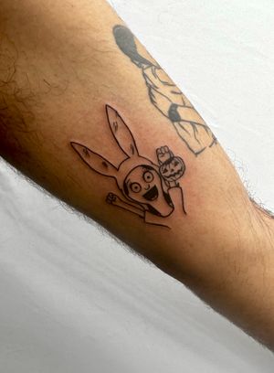 Adorable illustrative tattoo featuring a girl with bunny ears and a jack o lantern, by Miss Vampira.