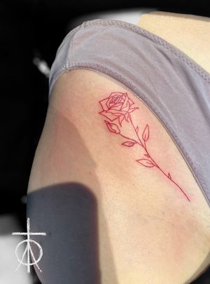 Fine Line Tattoo Amsterdam by Claudia Fedorovici #finelinetattoo #redinktattoo #rosetattoo #minimalism #cutetattoo #tinytattoo #finelinetattooartist #tattooartistsamsterdam #tempesttattooamsterdam #claudiafedorovici 