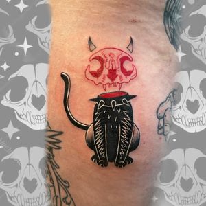 Get inked with a unique cat skull design by Galen Bryce (aka Drip Skull). Bold lines and intricate details make this tattoo stand out.