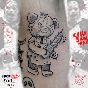Experience the fusion of cute and badass with this fine line tattoo by Galen Bryce (aka Drip Skull) featuring a bear wielding a chainsaw.