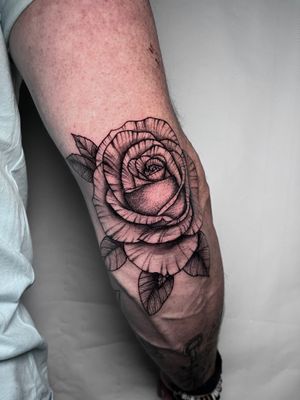 Exquisite dotwork and fine line detailing by Claudia Whiteheart, showcasing a beautiful and intricate flower design.