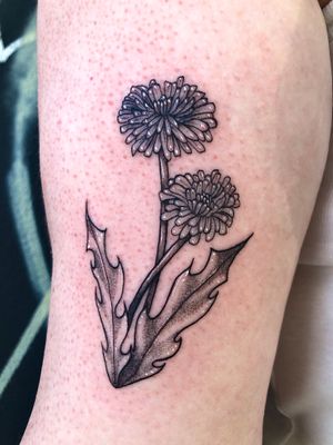 Get inked with a stunning dotwork floral design by the talented artist Claudia Whiteheart. Graceful and detailed, this illustrative tattoo is sure to stand out.