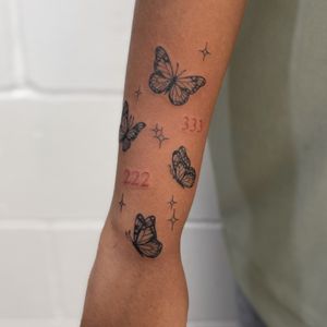 Get a stunning tattoo by Jenny Dubet combining delicate fine line work with a beautiful star and butterfly motif.