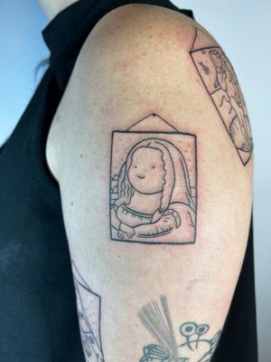 Get a cute and illustrative fine line tattoo of Mona Lisa with a frame by Jonathan Glick.