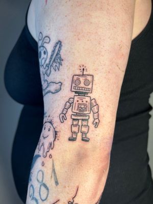 Intricate robot design by Jonathan Glick, featuring fine line details with an edgy, ignorant style.