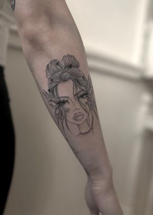 Elegant fine line and illustrative tattoo featuring a fairy woman, expertly created by talented artist Maddie.