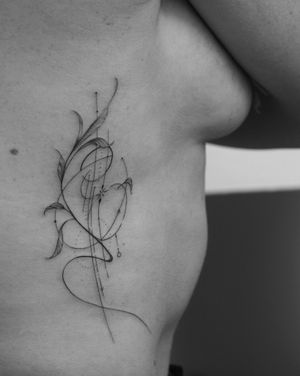 Explore the intricate beauty of Victoria's fine line geometric leaf tattoo, a stunning fusion of nature and geometry.