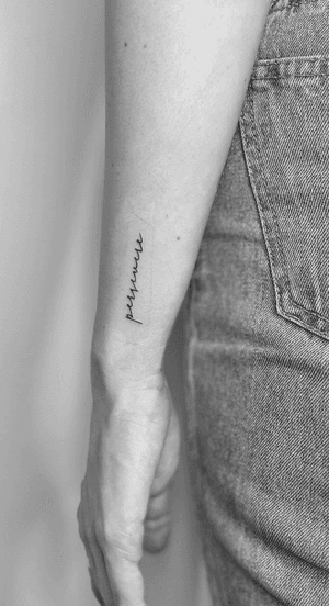 Get inked with delicate fine line and small lettering tattoo of 'persevere' in elegant cursive script by the talented artist Math.