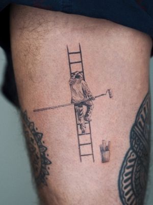 Fine line illustrative tattoo by Oscar Jesus depicting a painter climbing a stairway to inspiration.