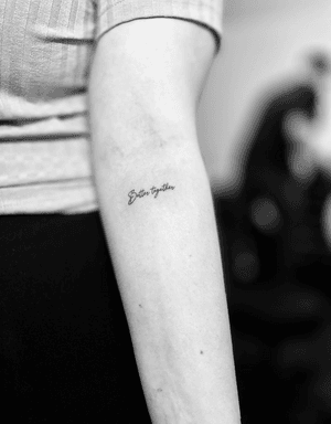 Get a beautifully crafted fine line tattoo with small cursive lettering that says 'Better Together' by the talented artist Vera.