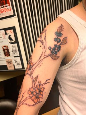 Capture nature's beauty with this stunning neo-traditional tattoo of a leaf and twig by talented artist Kiky Flore.