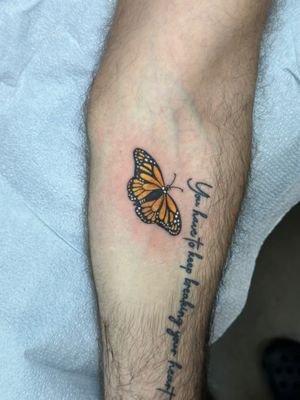 Small butterfly added to existing tattoo