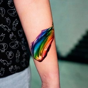 Rainbow brushstrokes tattoo