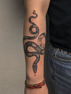 wrapping snake tattoo