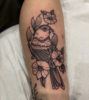 Elegant dotwork and illustrative style tattoo of a bird perched on a delicate flower, by skilled artist Barney Coles.