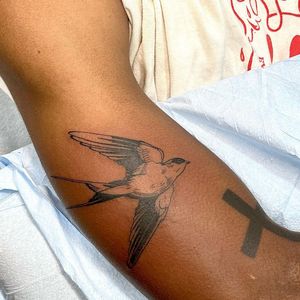 Get a stunning swallow tattoo done with fine line and illustrative style by the talented artist Seven. Perfect for those seeking a classic and intricate design.