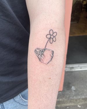 A little ring and flower with contrasting lines 