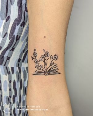 Flower from Book Tattoo made by Ganesh Prasad at Circle Tattoo Bangalore 