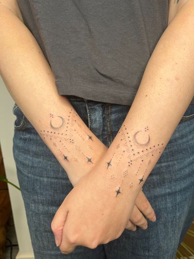 Get a delicate ornamental tattoo of the moon and star by Indigo Forever Tattoos. Experience the art of dotwork with a hand poke technique.