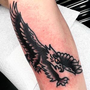Experience the power and beauty of this traditional eagle tattoo by the talented artist Alessandro Lanzafame.