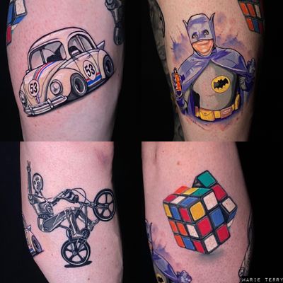 Get a vibrant watercolor tattoo featuring Batman, Rubik's Cube, Herbie, and a robot, done by Marie Terry on your lower leg.