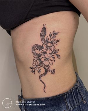 Floral Flower with Snake Tattoo made by Hemant Chavan at Circle Tattoo Pune