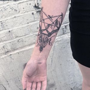 Elegant black and gray piece by Kiky Flore featuring a stunning deer skull motif, perfect for your forearm.