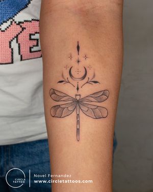 Dragonfly with a Moon Tattoo made by Novel Fernandez at Circle Tattoo India
