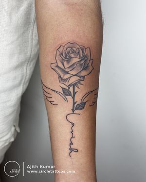 Rose Tattoo with Script made by Ajith Kumar at Circle Tattoo Bangalore