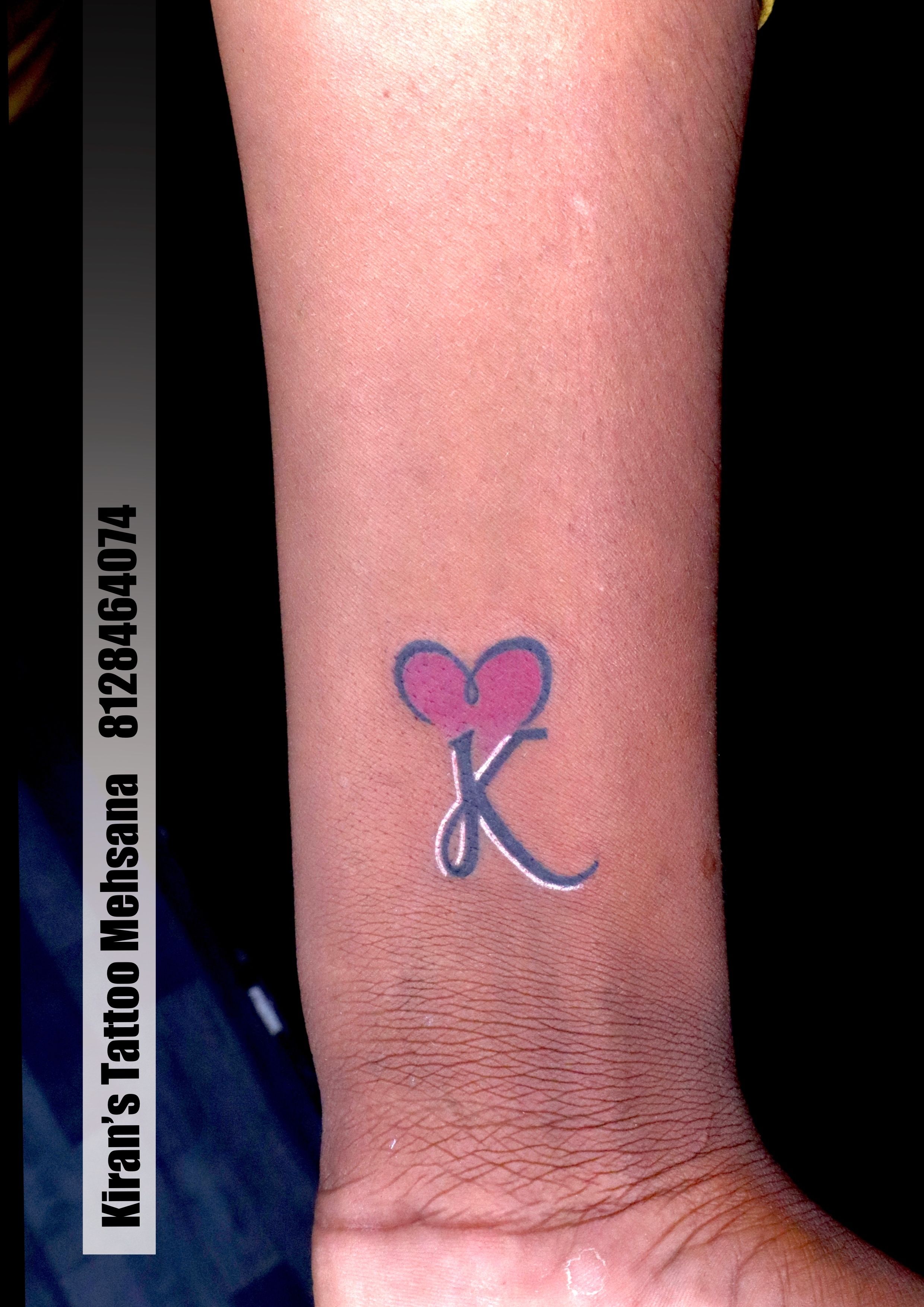 181 Tattooz Studio - Initial S and K merge in way to form a heart shape  which is highlighted by red color. The initial tattoo on wrist is most  preferred tattoo by