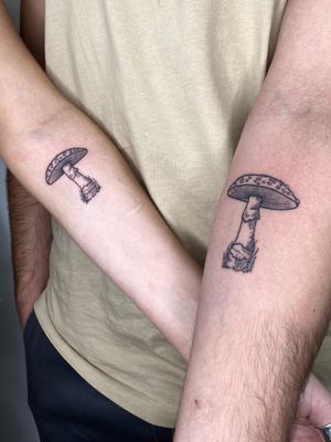 Experience the unique blend of nature and art with this illustrative tattoo featuring a mushroom motif with etch details, skillfully designed by Liam Collins.
